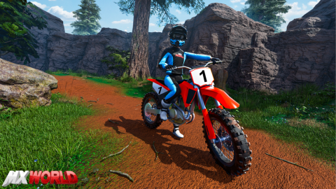 MX WORLD rider on a red dirt bike on a forest trail